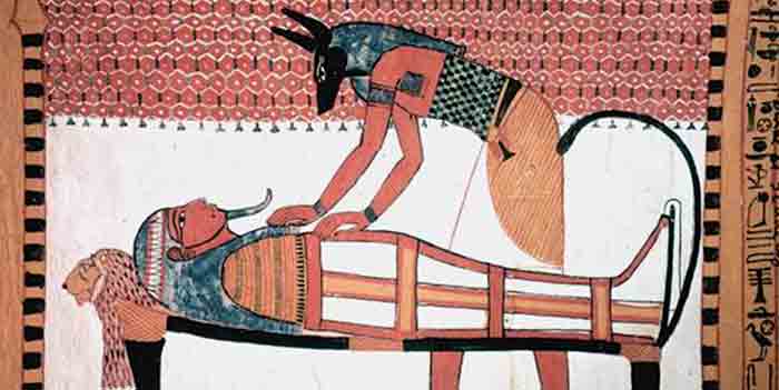 Depiction of Anubis preparing a corpse for mummification
