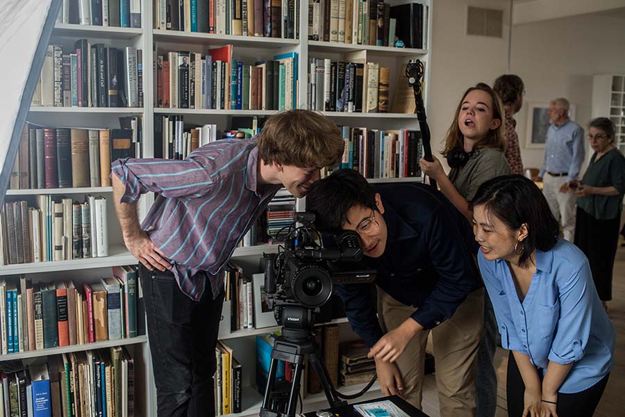 Students with a camera and sound equipment during a DocuLab shoot