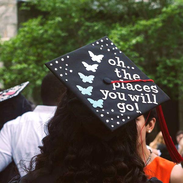Oh the places you will go written on a graduation cap