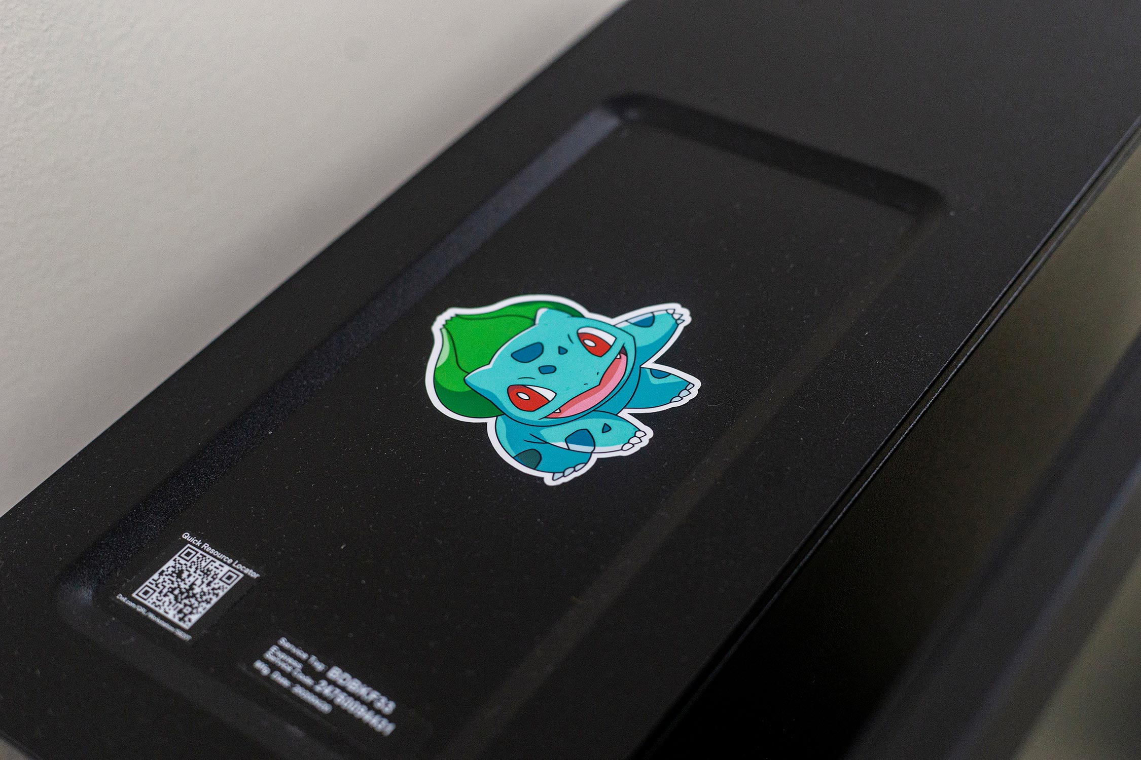 Computer with a bulbasaur sticker