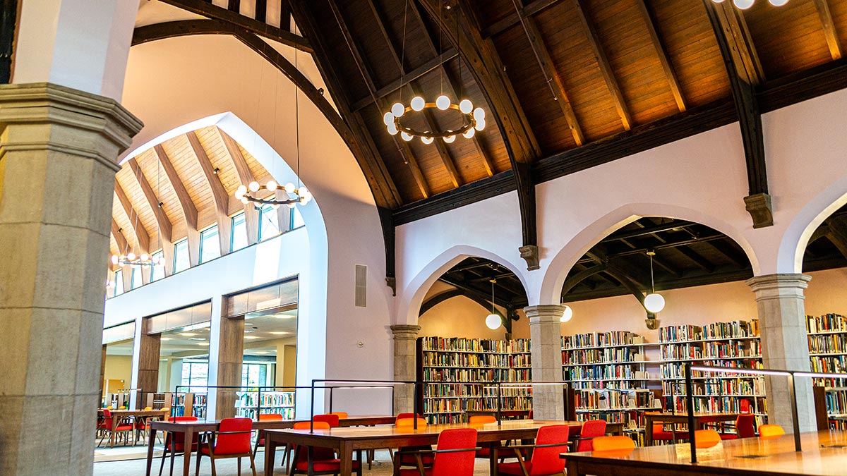 Tables and bookcases inside the Lutnick Library
