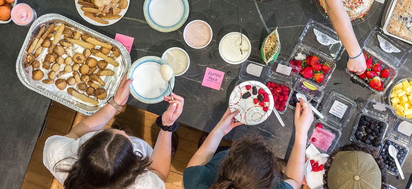 Overhead shot of people using the community kitchen