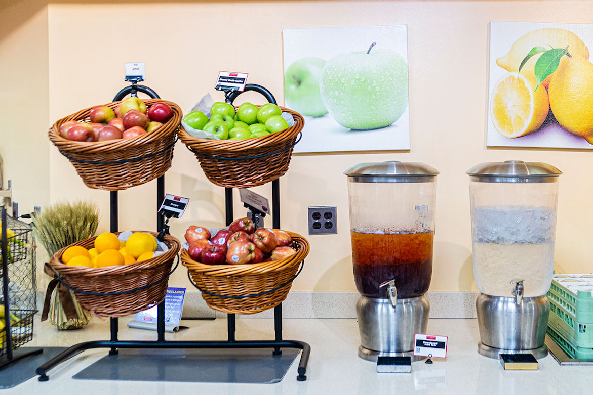 iced tea, water, and other drinks on display