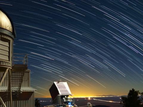 Photo of stars smeared across the night sky using exposure