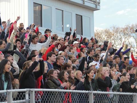 Fans cheering for athletics teams on Haverford's campus