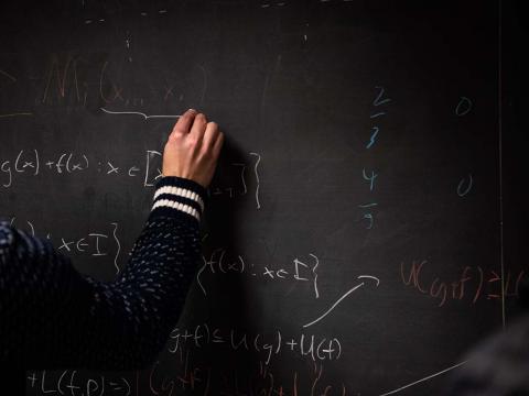 a student works on math equations