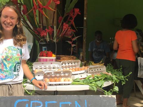 Amelia Keyser-Gibson in the Green Market selling eggs