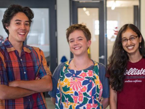 Silvan Sooksatan ’21, Julia Coletti '21, Neha Thumu '24, and Isabel Ray '23 stand together in the Maker Arts Space. 