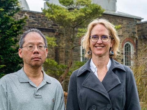 Wynn Ho and Andrea Lommen stand in front of Strawbridge Observatory.