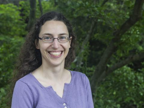 photo of Sarah Horowitz, smiling, standing in front of a tree
