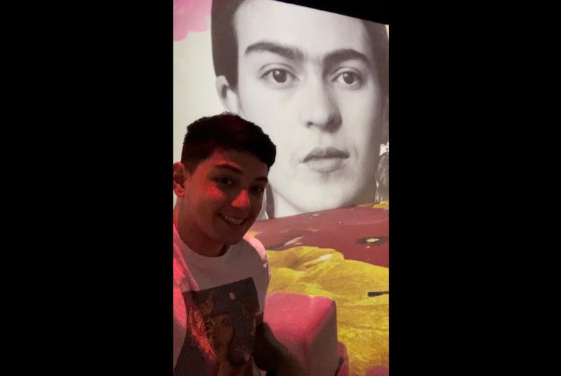  Brandon taking a selfie in front of “Frida Kahlo: The Life Of An Icon” at the Sydney Festival 2023.