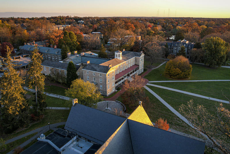An aerial view of Haverford's campus depicts its buildings in early morning light.