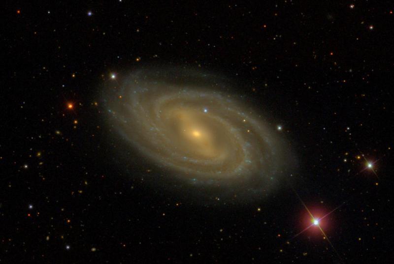 A swirling galaxy, known as Messier 109, that is around 85 million light years away in the direction of the Big Dipper.
