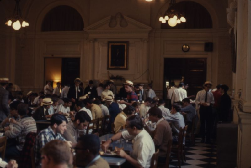 color photo of students gathered for a meal in Founders Great Hall