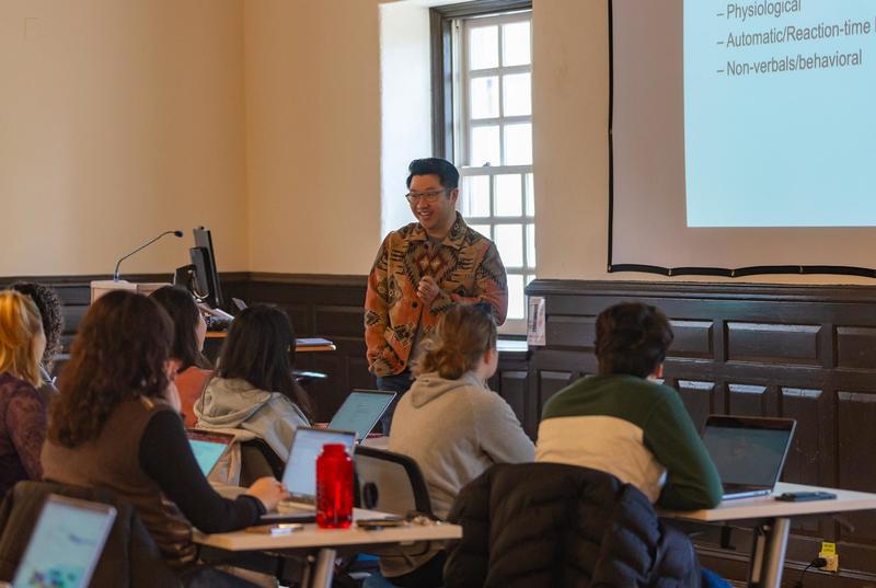 Ryan Lei speaks to students in a classroom on Haverford's campus. 