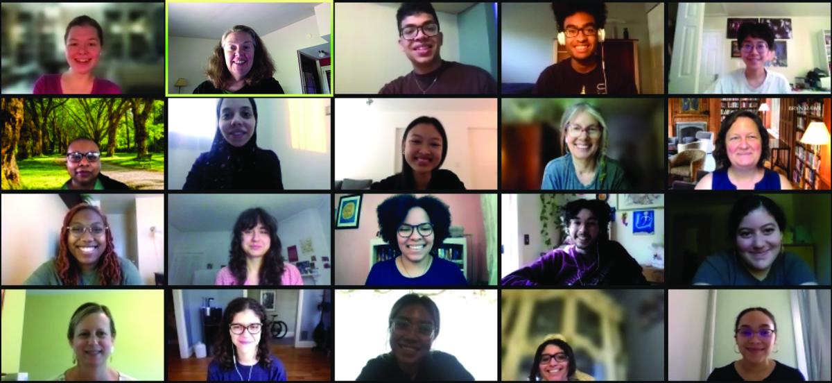 a Zoom screenshot of 20 smiling students and staff