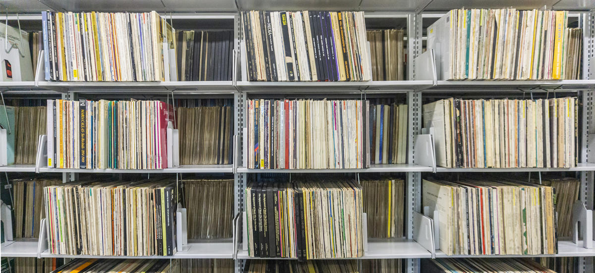 Rows of organized vinyl records, stacked on shelves in the Harris Music Library at Haverford College.