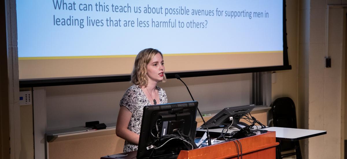  Amanda Grolig '19 presents her research "Restorative Justice Education and Masculine Flexibility." Photo by Kian Williams '22