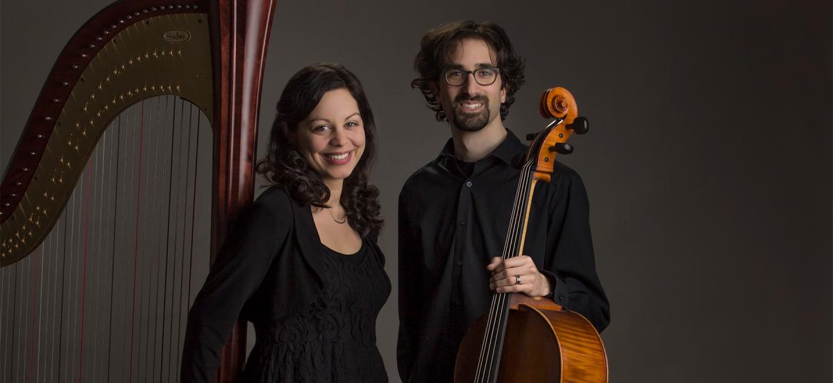 Lily Press '09 and Simon Linn-Gerstein '09 stand with their harp and cello, respectively, in front of a dark background.
