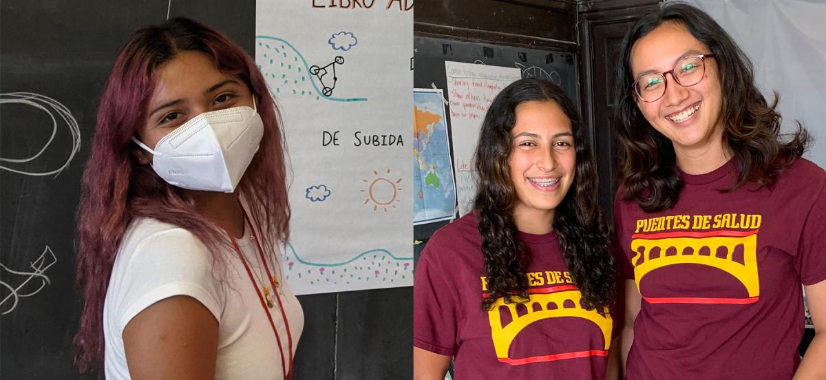 Sunny Martinez '24 stands in front of a chalkboard, while Keishla Sanchez '22 and Elana Bien '24 stand in a classroom at Puentes de Salud.