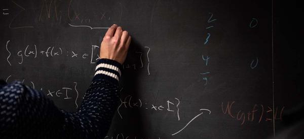a student works on math equations