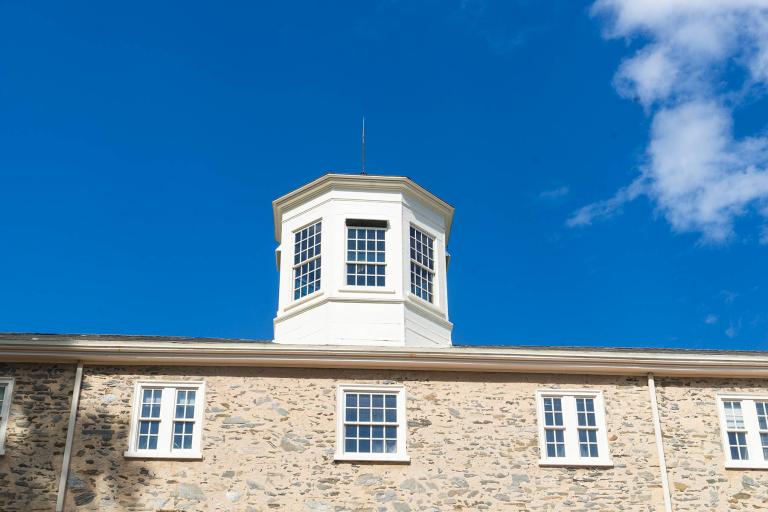 A beautiful blue sky behind the cupola on Founders Hall